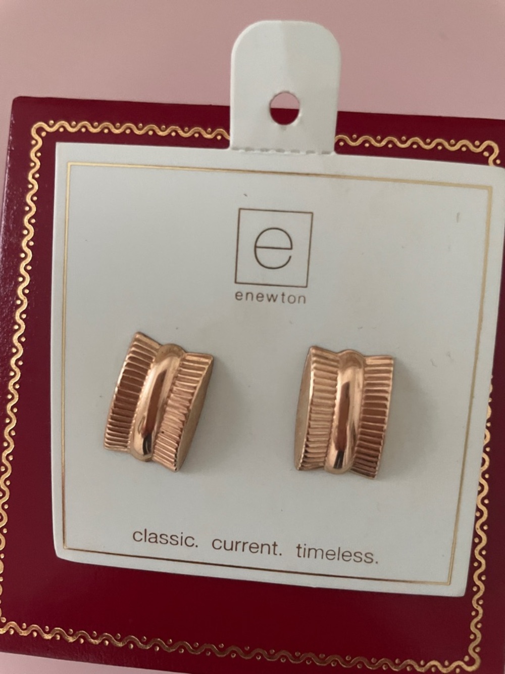 E Newton gold earrings